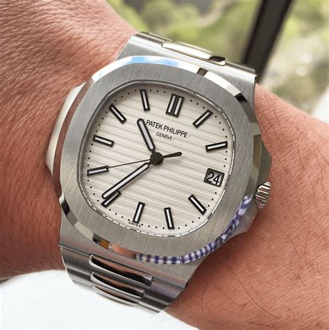 patek philippe nautilus stainless steel white dial wrist|patek philippe nautilus cost.